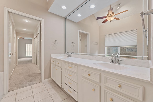 3708 Masters Ct, League City, TX 77573 - bathroom with a ceiling fan, lofted ceiling, tile patterned floors, double vanity, and recessed lighting