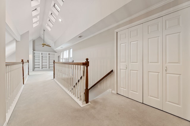 3708 Masters Ct, League City, TX 77573 - hallway featuring an upstairs landing, light colored carpet, lofted ceiling, and baseboards
