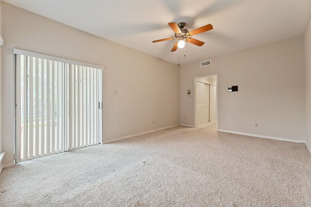 3708 Masters Ct, League City, TX 77573 - unfurnished room featuring a ceiling fan, baseboards, and light colored carpet