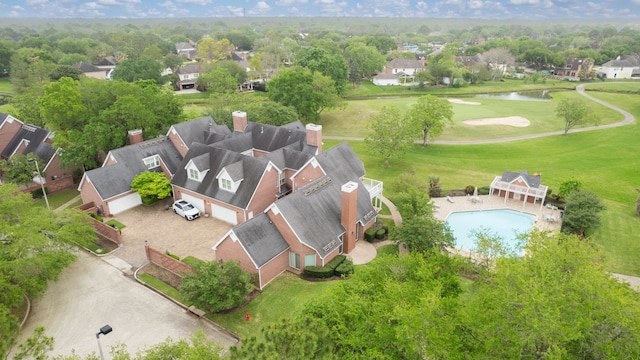 3708 Masters Ct, League City, TX 77573 - aerial perspective of suburban area with a golf course, a nearby body of water, and a pool