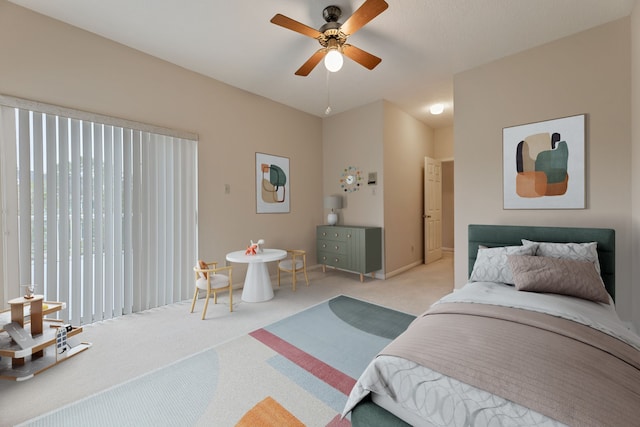 3708 Masters Ct, League City, TX 77573 - carpeted bedroom with baseboards and ceiling fan