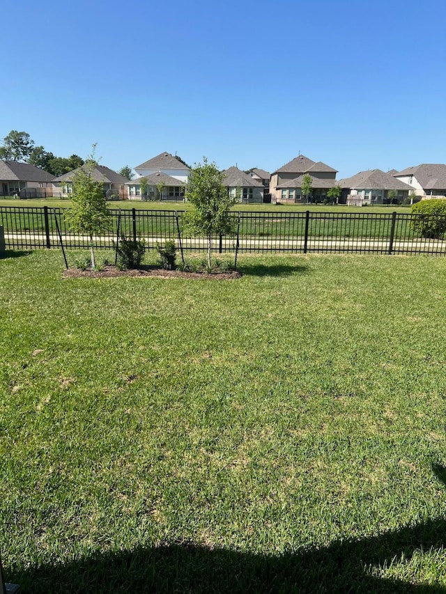 26767 Grandiflora Dr, Magnolia, TX 77355 - view of yard with a residential view and fence