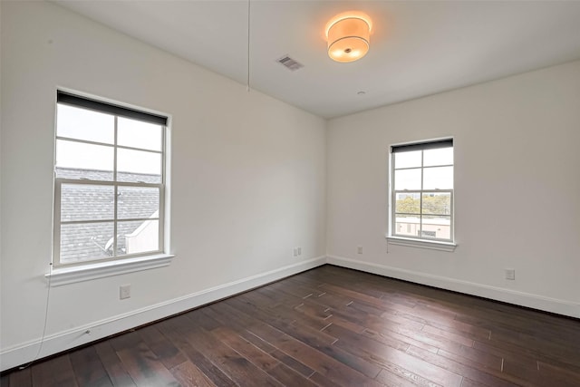 5101 Allen St, Houston, TX 77007 - unfurnished room featuring dark wood-type flooring and baseboards