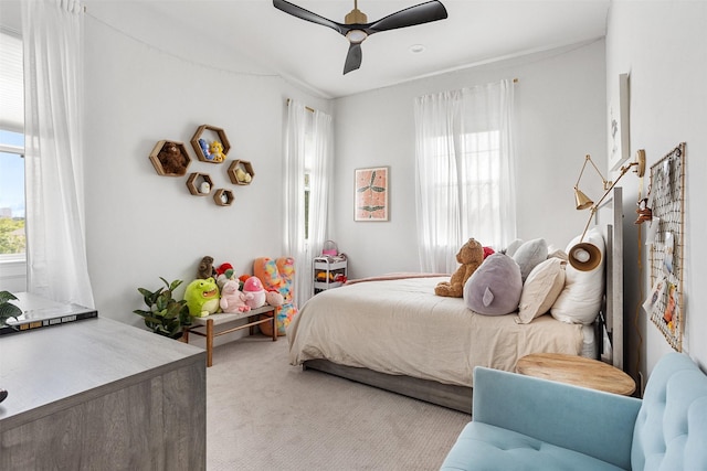 4504 Yupon St, Houston, TX 77006 - bedroom with light colored carpet and a ceiling fan
