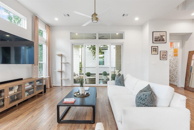 4504 Yupon St, Houston, TX 77006 - living area featuring a ceiling fan, wood finished floors, recessed lighting, and baseboards