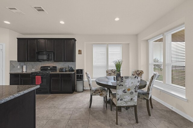 dining space featuring visible vents, baseboards, recessed lighting, and light tile patterned floors