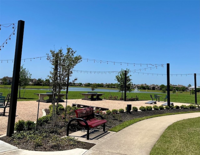 surrounding community featuring a lawn