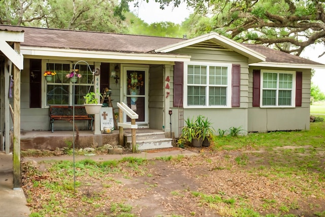 447 Fm 2540 N, Van Vleck, TX 77482 - single story home with a porch and a shingled roof