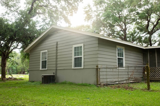 447 Fm 2540 N, Van Vleck, TX 77482 - view of side of property featuring a lawn and central AC