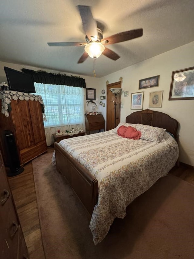 447 Fm 2540 N, Van Vleck, TX 77482 - bedroom with wood finished floors and ceiling fan