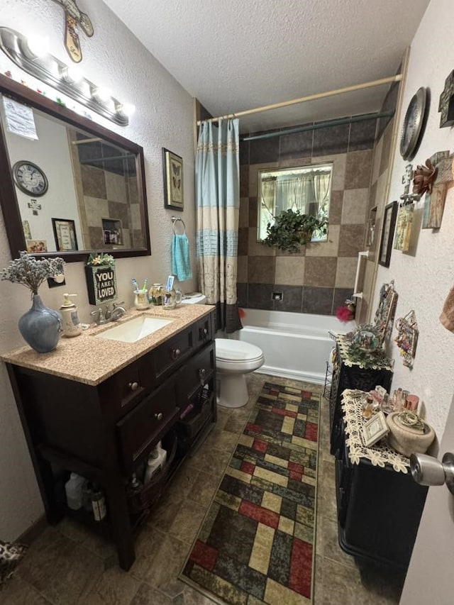 447 Fm 2540 N, Van Vleck, TX 77482 - full bath with a textured wall, a textured ceiling, toilet, shower / tub combo, and vanity