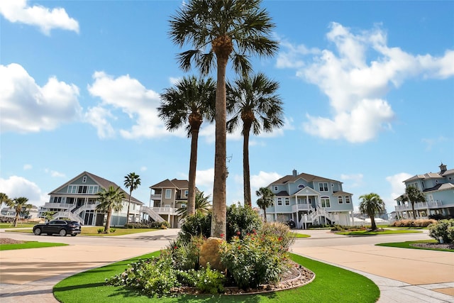 20710 E Sunset Bay Dr, Galveston, TX 77554 - view of community featuring curved driveway and a residential view