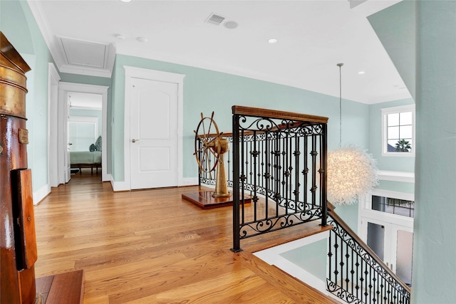 20710 E Sunset Bay Dr, Galveston, TX 77554 - stairway featuring attic access, wood finished floors, baseboards, visible vents, and recessed lighting