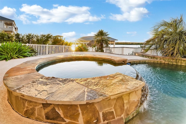 20710 E Sunset Bay Dr, Galveston, TX 77554 - view of pool featuring a fenced in pool, a jacuzzi, and fence