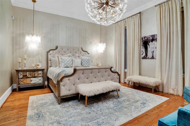 20710 E Sunset Bay Dr, Galveston, TX 77554 - bedroom with crown molding, baseboards, a chandelier, wallpapered walls, and wood finished floors