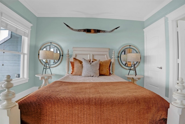 20710 E Sunset Bay Dr, Galveston, TX 77554 - bedroom featuring ornamental molding and multiple windows