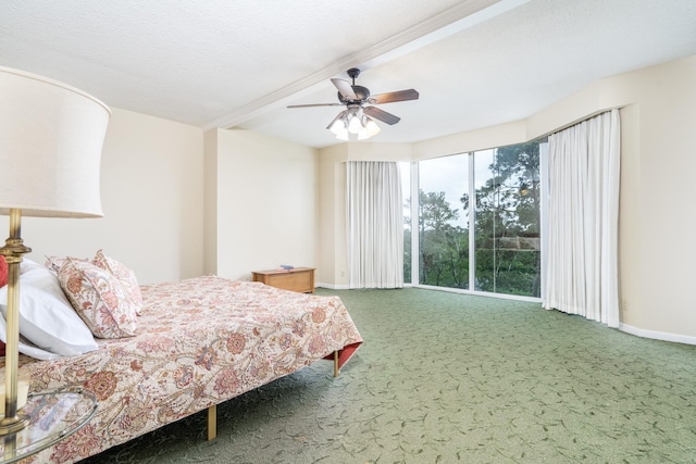 150 Gessner Rd Unit 7D, Houston, TX 77024 - carpeted bedroom with baseboards and a ceiling fan