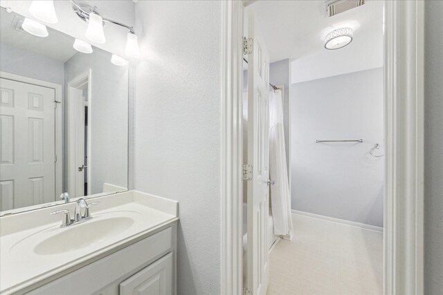 full bath featuring visible vents and vanity