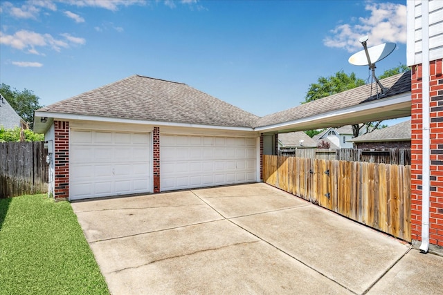 garage with fence