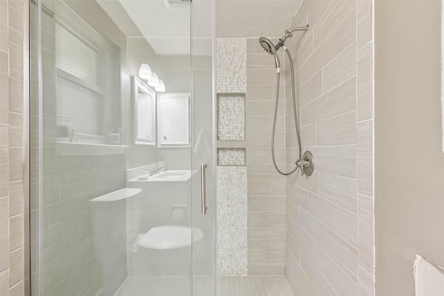 18210 Point Lookout Dr, Houston, TX 77058 - full bath featuring a shower stall and a sink
