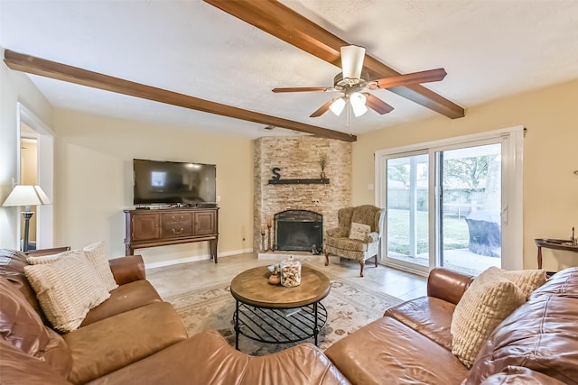 18210 Point Lookout Dr, Houston, TX 77058 - living area featuring beam ceiling, a ceiling fan, and a fireplace