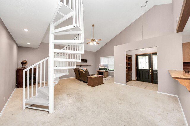 3810 Peters San Felipe Rd, Sealy, TX 77474 - carpeted living room with high vaulted ceiling, a ceiling fan, recessed lighting, stairs, and baseboards