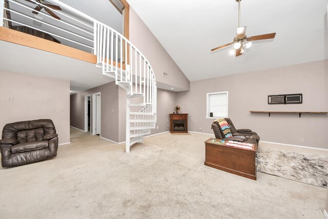 3810 Peters San Felipe Rd, Sealy, TX 77474 - living room featuring ceiling fan, carpet, baseboards, and stairs
