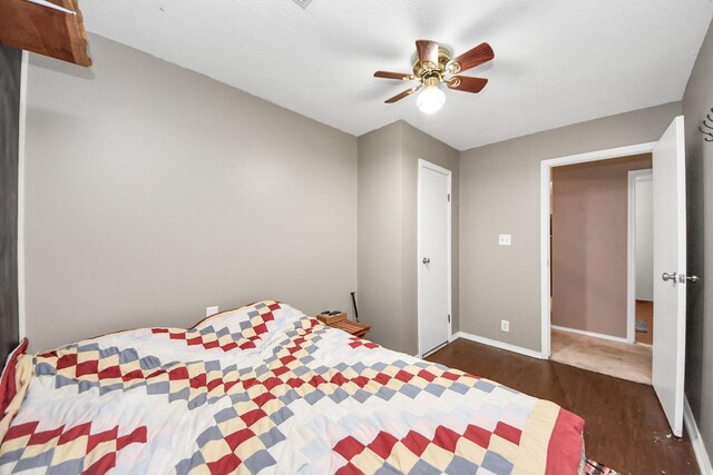3810 Peters San Felipe Rd, Sealy, TX 77474 - bedroom featuring baseboards, a ceiling fan, and wood finished floors