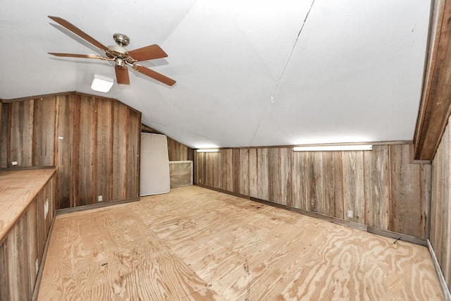 3810 Peters San Felipe Rd, Sealy, TX 77474 - bonus room featuring light wood-style floors, wooden walls, a ceiling fan, and vaulted ceiling