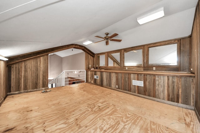 3810 Peters San Felipe Rd, Sealy, TX 77474 - additional living space with visible vents, wood walls, ceiling fan, and vaulted ceiling