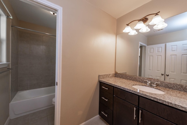 17035 Wilthorne Gardens Ct, Houston, TX 77084 - bathroom with tile patterned floors, toilet, baseboards, visible vents, and vanity