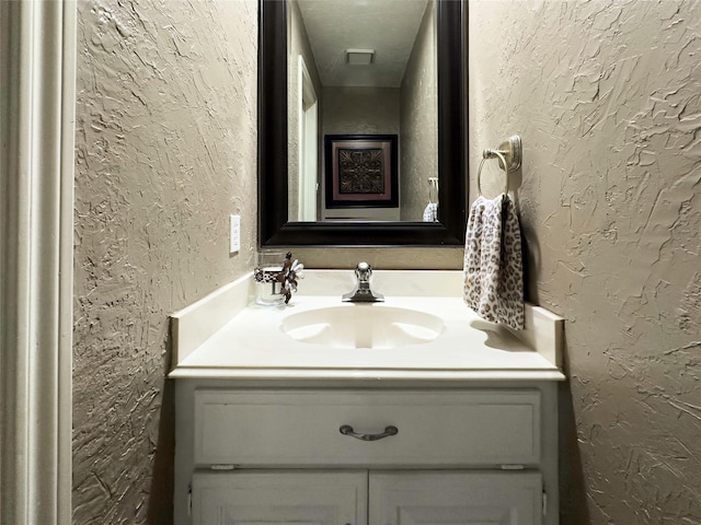 2202 Canterbury Ct, Deer Park, TX 77536 - bathroom with vanity and a textured wall