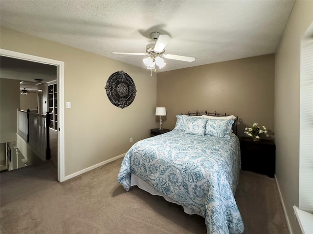 2202 Canterbury Ct, Deer Park, TX 77536 - carpeted bedroom featuring baseboards and a ceiling fan