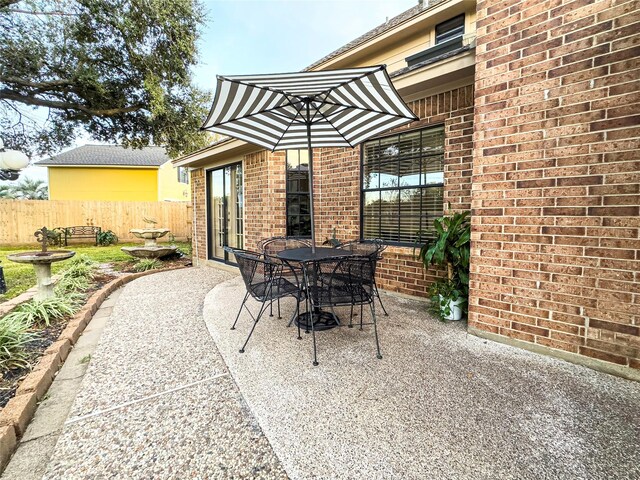 2202 Canterbury Ct, Deer Park, TX 77536 - view of patio featuring outdoor dining space