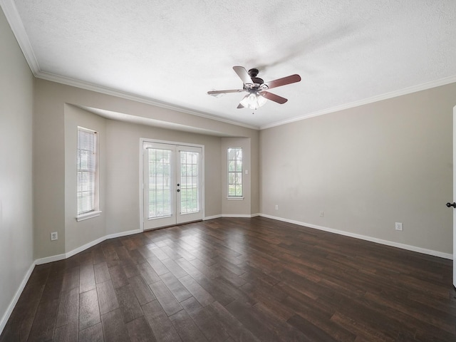 2202 Canterbury Ct, Deer Park, TX 77536 - empty room featuring dark wood finished floors, baseboards, ceiling fan, ornamental molding, and french doors