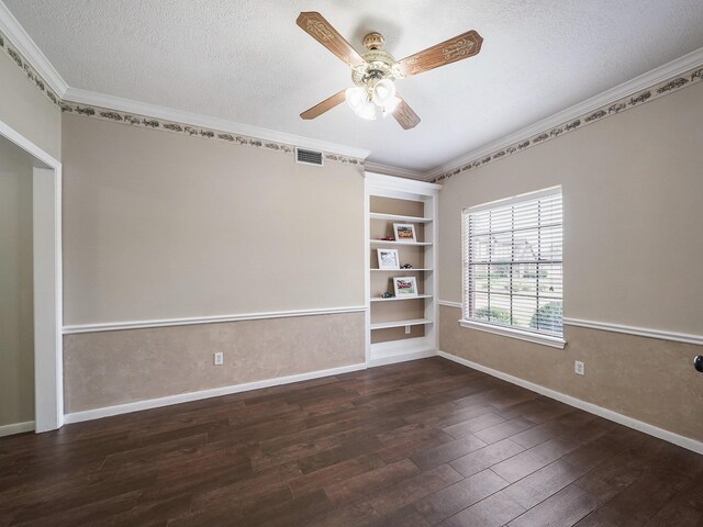 2202 Canterbury Ct, Deer Park, TX 77536 - empty room featuring wood-type flooring, built in shelves, a textured ceiling, baseboards, and ornamental molding