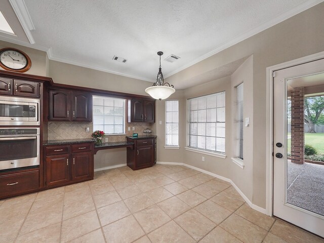 2202 Canterbury Ct, Deer Park, TX 77536 - kitchen featuring stainless steel appliances, dark countertops, light tile patterned floors, healthy amount of natural light, and ornamental molding