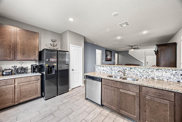 24818 Russet Bluff Trl, Houston, TX 77336 - kitchen with black fridge with ice dispenser, visible vents, dishwasher, wood finish floors, and a sink