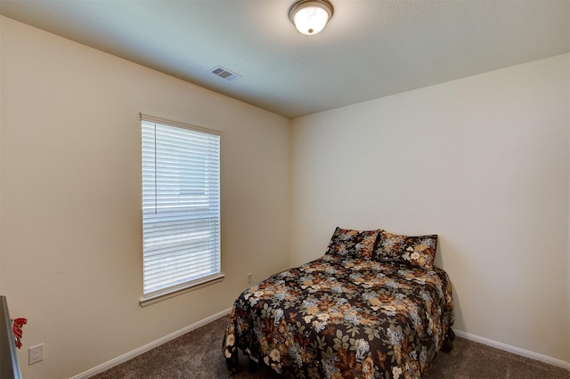 12006 Wooden Mill Ln, Santa Fe, TX 77510 - carpeted bedroom featuring baseboards and visible vents