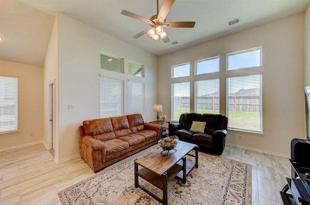 12006 Wooden Mill Ln, Santa Fe, TX 77510 - living area with ceiling fan, baseboards, and visible vents