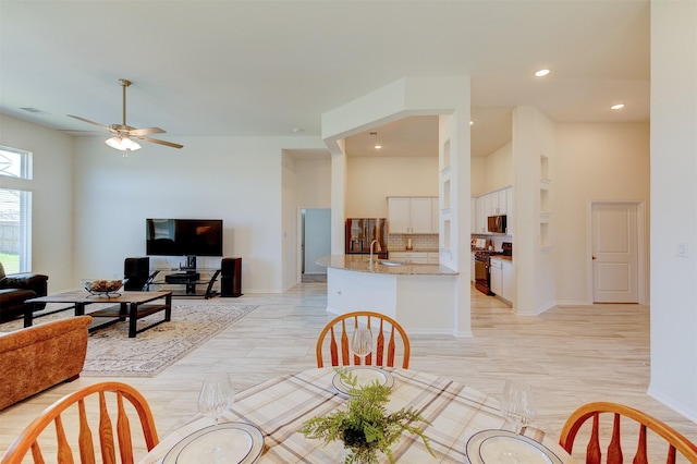 12006 Wooden Mill Ln, Santa Fe, TX 77510 - dining room featuring recessed lighting, baseboards, and a ceiling fan