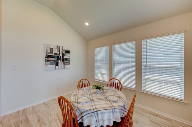 12006 Wooden Mill Ln, Santa Fe, TX 77510 - dining area featuring baseboards and vaulted ceiling