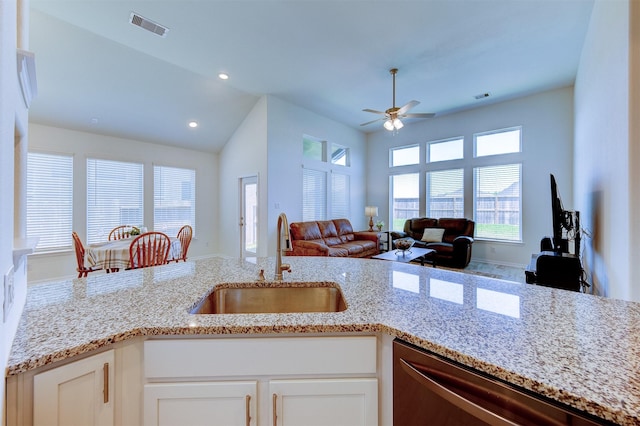 12006 Wooden Mill Ln, Santa Fe, TX 77510 - kitchen with ceiling fan, visible vents, dishwasher, a sink, and open floor plan