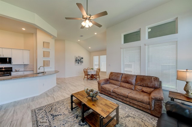 12006 Wooden Mill Ln, Santa Fe, TX 77510 - living area with a ceiling fan, lofted ceiling, and recessed lighting