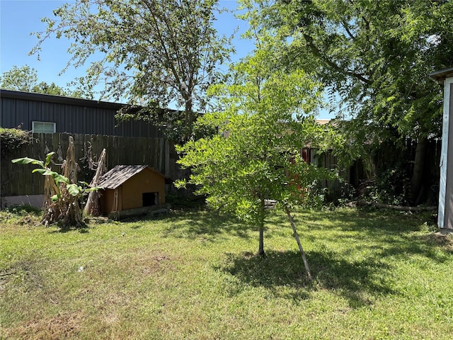 431 Crockett St, Channelview, TX 77530 - view of yard with an outdoor structure and fence