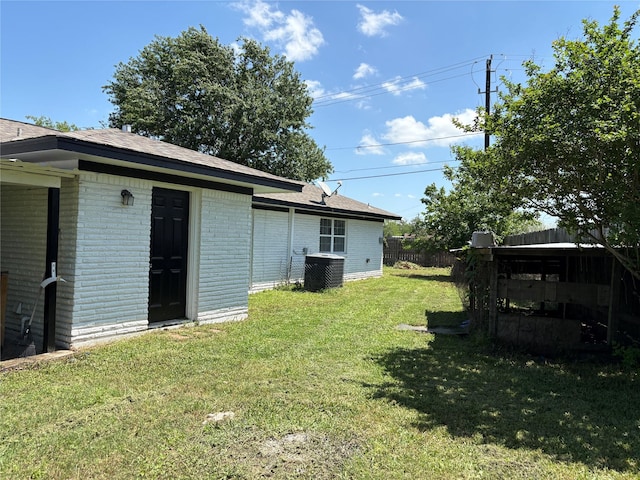 431 Crockett St, Channelview, TX 77530 - view of yard featuring central AC and fence