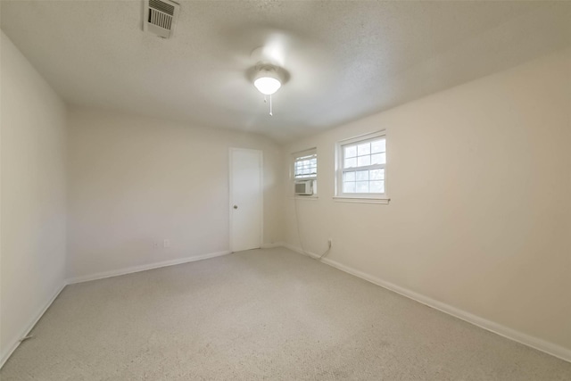 10607 Longmont Dr, Houston, TX 77042 - carpeted spare room featuring baseboards and cooling unit