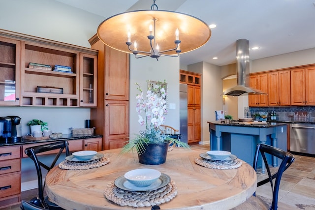 dining space featuring a chandelier and recessed lighting