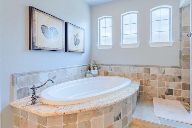 bathroom featuring a bath