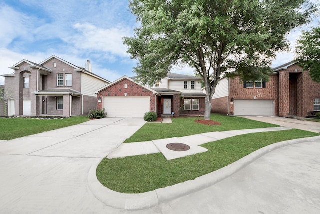 traditional home featuring a front yard, brick siding, and concrete driveway